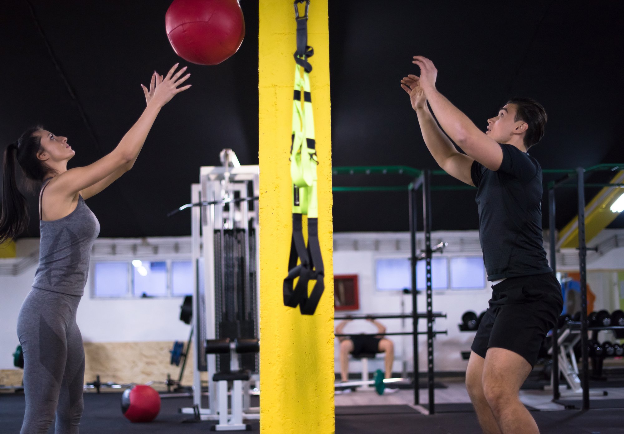 young-athletes-couple-working-out-with-medical-bal-2025-01-15-16-09-22-utc